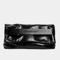 The OG bag in Ink, folded as an oversized black vegan leather clutch with Restored Self logo band